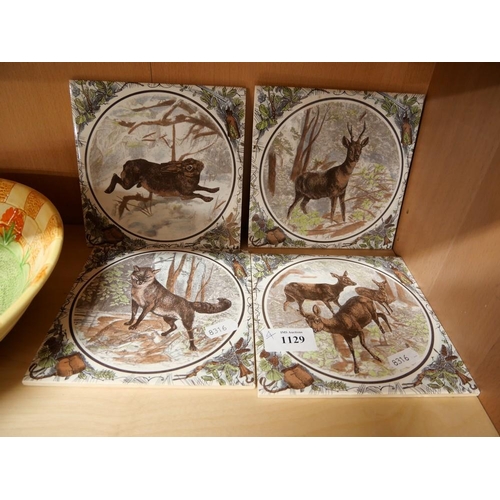 1129 - Set of Four German Glazed Pottery Tiles - Game Animals, approx 6 x 6 inches.