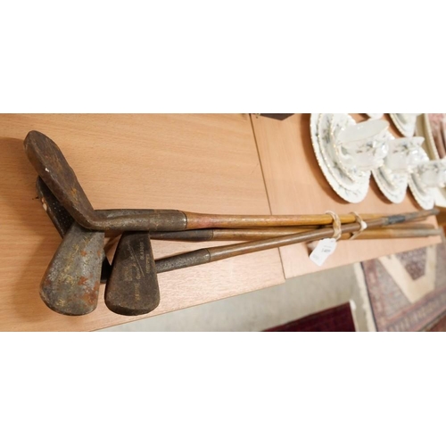 1409 - Collection of Four Hickory Shafted Golf Clubs.