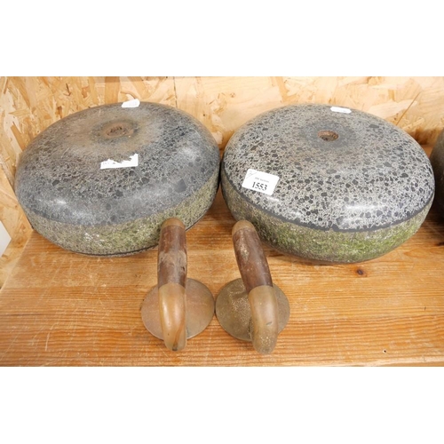 1553 - Two Granite Curling Stones with Loose Handles.