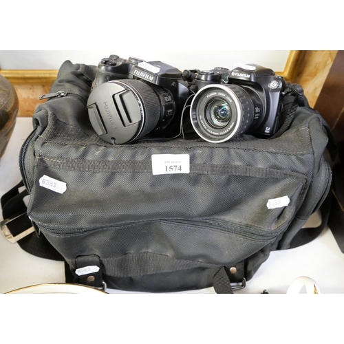 1574 - Two Fujifilm Digital Cameras in Bag (AF) no chargers or batteries.