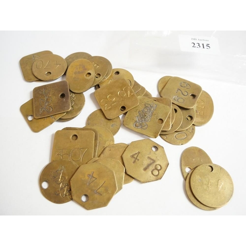 2315 - Collection of Brass Numbered Tokens.