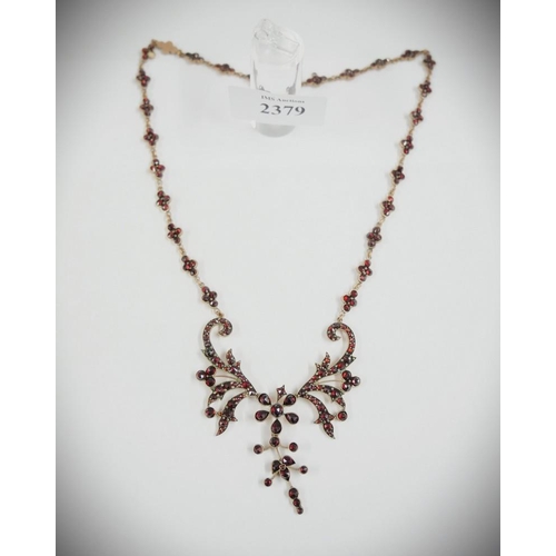 2379 - Vintage Garnet Encrusted Yellow Metal Necklace.