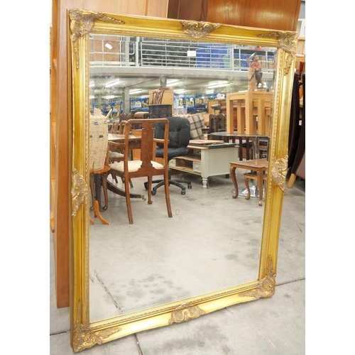 3242 - Large Gilt Framed Bevelled Wall Mirror (137cm x 106cm)