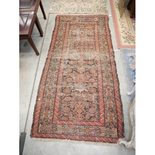 3262 - Antique Geometric Wool Rug on Red Ground 94cm x 208cm