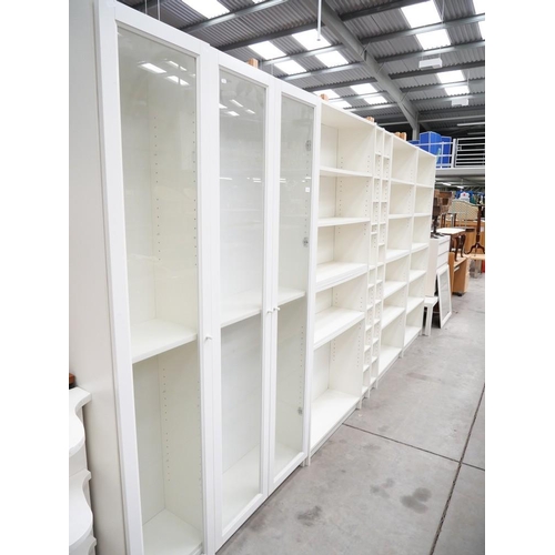 3414 - Two Glass Fronted Display Cabinets, 3 Matching Bookcases, 2 CD Racks - all 203cms Tall