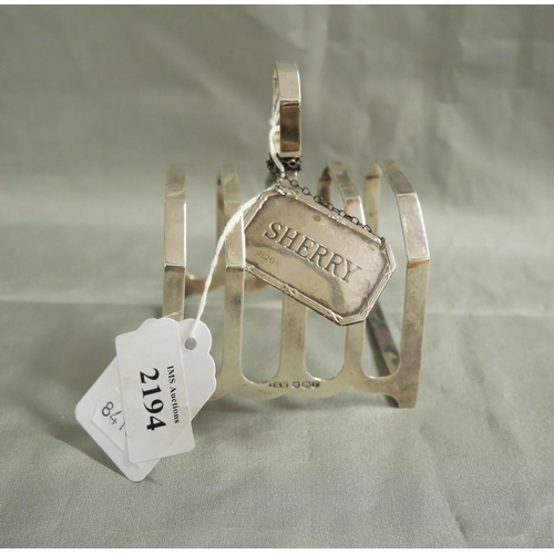 2194 - 20th Century Sheffield Silver Five Bar Toast Rack & London Silver Sherry Label, approx 3oz troy.