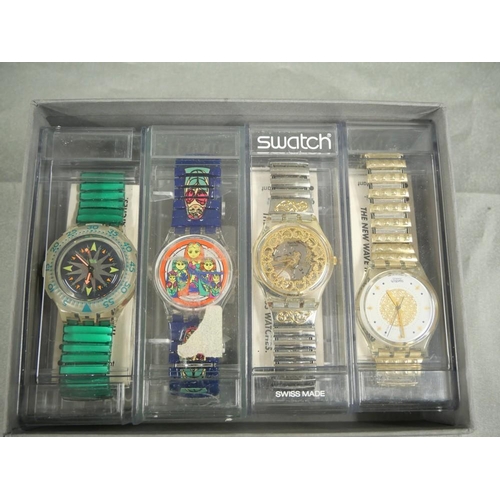 2301 - Four Vintage Swatch Wristwatches.