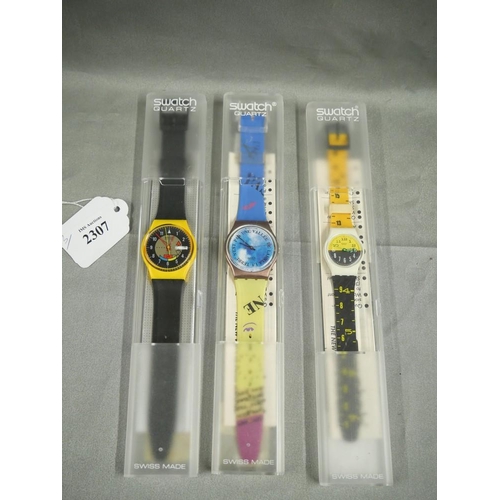 2307 - Three Vintage Swatch Wristwatches.