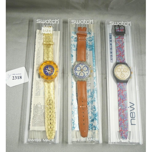 2318 - Three Vintage Swatch Wristwatches.