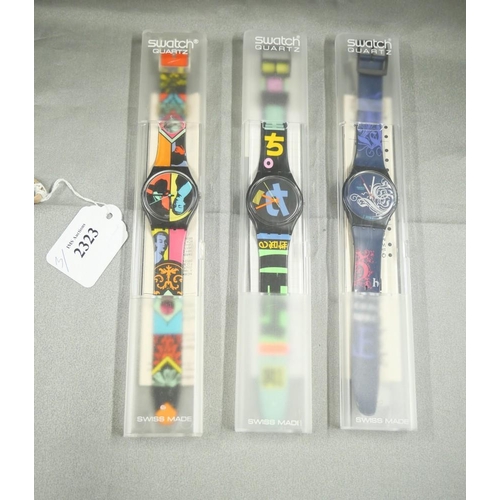 2323 - Three Vintage Swatch Wristwatches.