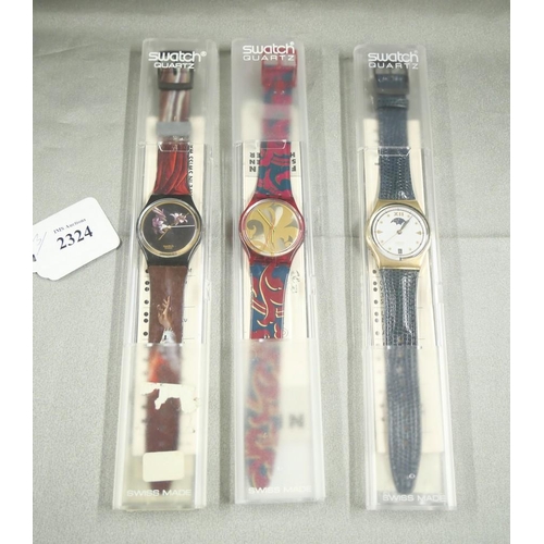 2324 - Three Vintage Swatch Wristwatches.