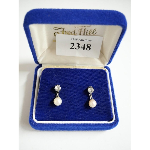 2348 - Cased Pair of White Sapphire and Pearl Earrings.