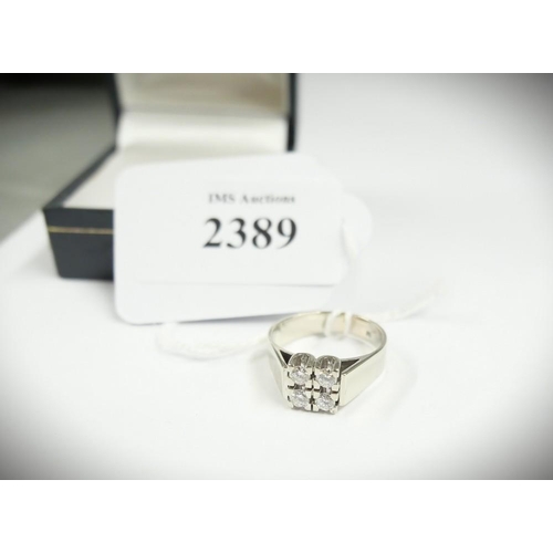 2389 - 14ct White Gold Ring Inset with Four Square Cut Diamonds, UK Size P, total weight 5.7g