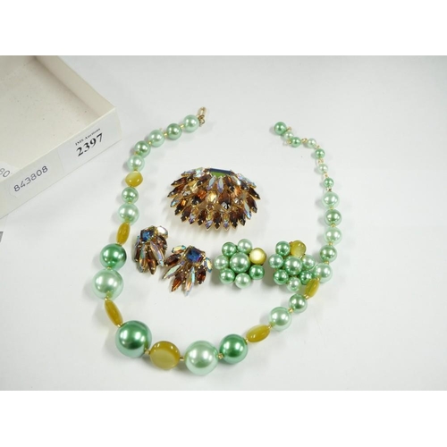 2397 - Box containing Beaded Necklaces with matching Earrings & Brooch with matching Earrings