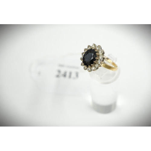 2413 - 9ct Gold Ring with Sapphire Surrounded by small CZ, UK size N,  total weight 3.9g.