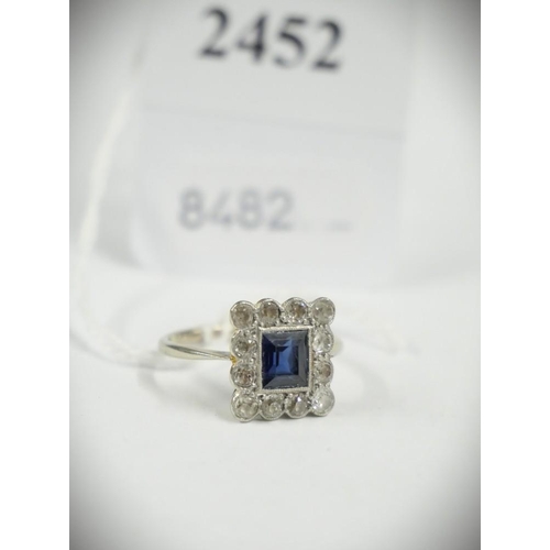 2452 - 9ct White Gold Dress Ring Inset with Square Cut Central Sapphire Surrounded with 12 Small Diamonds, ... 