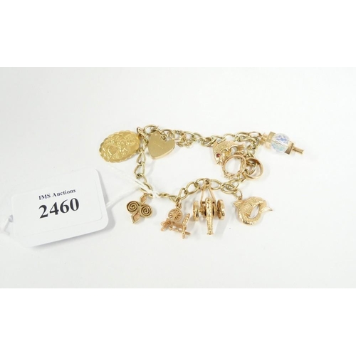 2460 - 9ct Gold Charm Bracelet - 25.4gms