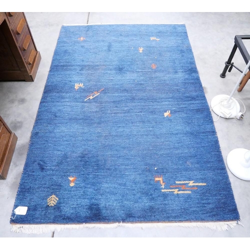 3075 - Fringed Wool Rug on Blue Ground 197cm x 137cm