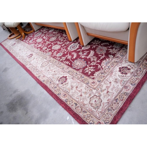 3458 - Geometric Woolen Floral Rug On Red Ground. Approx. 306 x 206cm