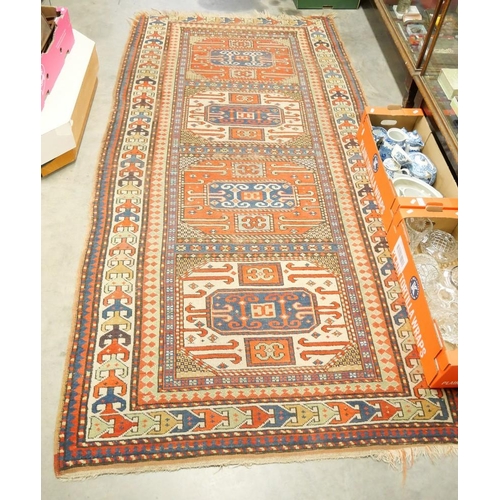 1651 - Antique Caucasian Wool Rug, four central guls within a geometric border, predominately red, approx 2... 