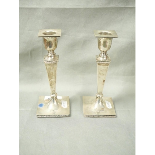 2239 - Pair of Sheffield Silver Candlesticks (loaded) 17cm tall.