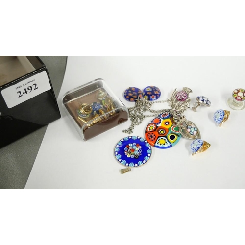 2492 - Assorted Paperweight Pedants, studs etc