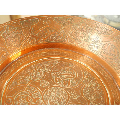 1282 - Antique Islamic Engraved Copper Dish, approx 30cm in diameter.