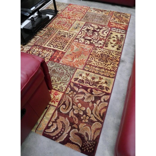 3174 - Geometric Rug On Brown Ground. Approx. 160cm X 230cm