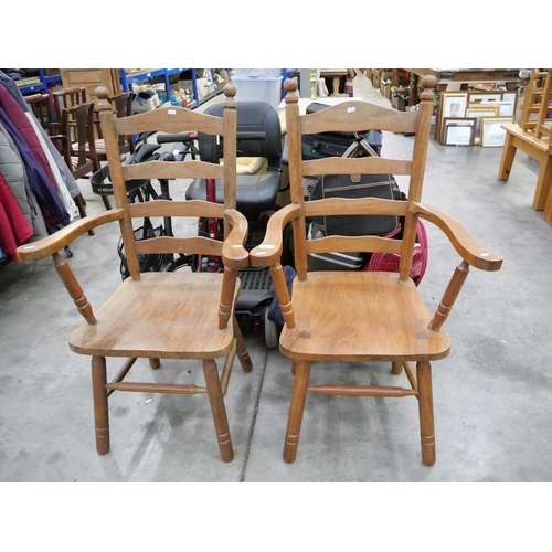 3395 - Pair of Oak Elbow Chairs.