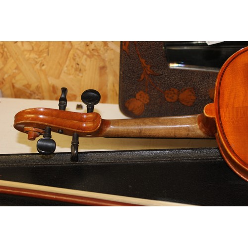 576 - Violin & Bow in Carry Case - 60cm long x 21cm wide.