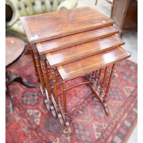 3321 - Reproduction Figured Mahogany Nest of Four Tables.