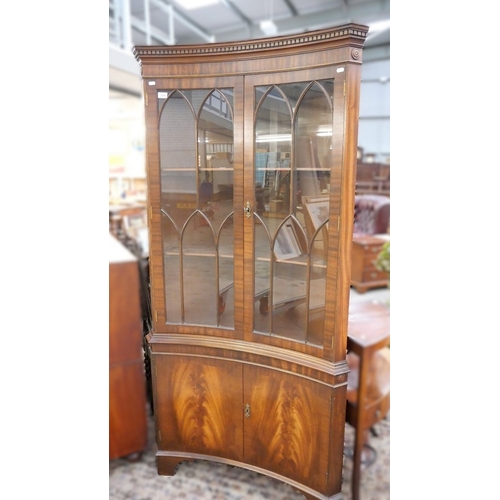 3345 - Fine Reproduction Figured Mahogany Concave Corner Cabinet.