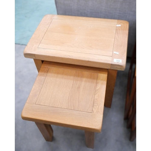 3349 - Modern Oak Nest of two Tables.