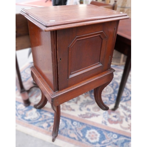 3362 - Mahogany Cabinet with Moulded Top Edge, supported on four Sabre shaped legs.