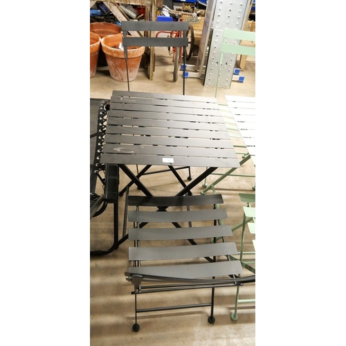 49 - Painted Cast Metal Folding Patio Table and Two Chairs