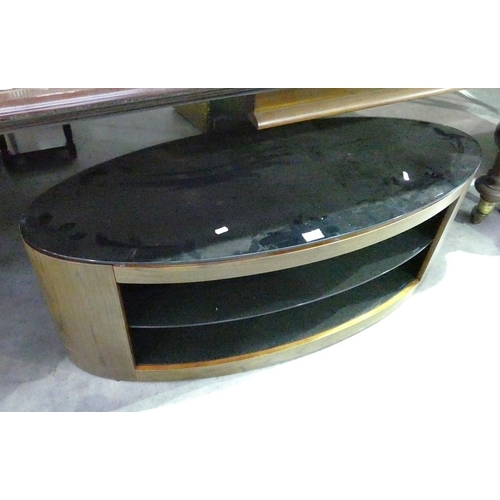 3052 - Oval Smoked Glass Tv Stand. L 111cm W 46cm H 43cm