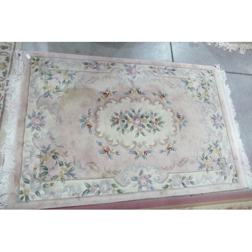 3047A - Fringed & Bordered Floral Rug On Pink Ground. Approx. 186cm X 120cm