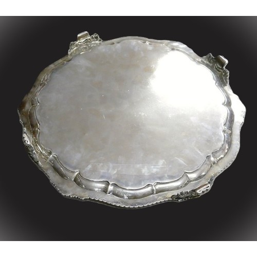 2274 - Large London Silver Salver, approx 46cm in diameter, supported on four scrolling bracket feet, 82oz ... 