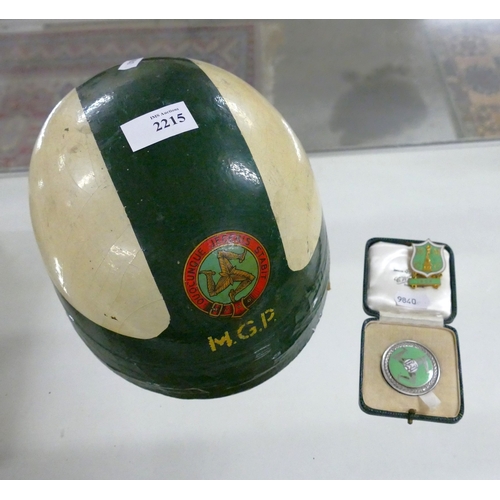 Vintage Isle of Man Motorcycle Racing Helmet, Cased Completion Medal awarded to Brian Nayler in 1959 & two enamel Manx Medallions.