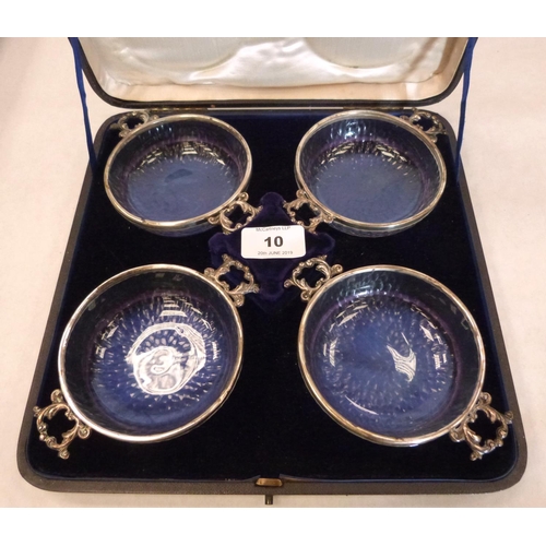 10 - A Victorian cased set of four silver rimmed cut glass finger bowls. London 1897