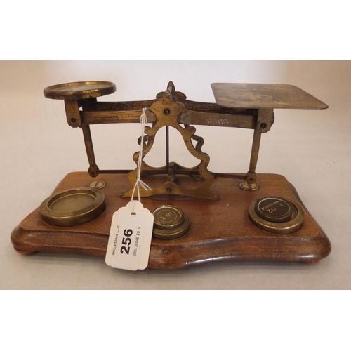 256 - A Victorian set of gilt brass postal scales