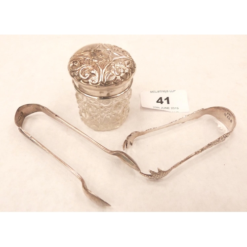 41 - Two silver sugar bows and a small silver repousse top cut class jar