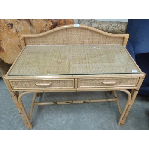 417 - A bamboo dressing table with two frieze drawers. 39' wide