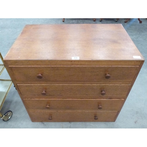 420 - An oak chest of four long drawers. 29½' wide