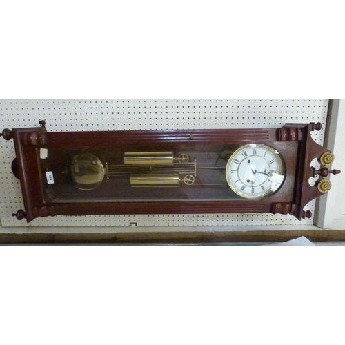 428 - A Vienna style clock of recent manufacture, the two train movement with compensated pendulum. 41' hi... 