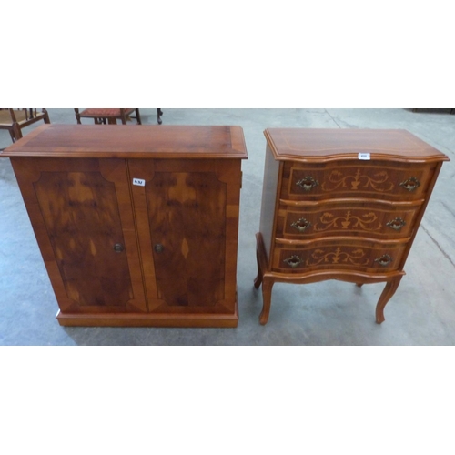 431 - An inlaid serpentine chest of three drawers, 22½' wide and a yew veneered cabinet