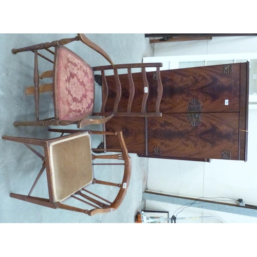 432 - Two Edward VII line inlaid elbow chairs together with a mahogany cocktail cabinet