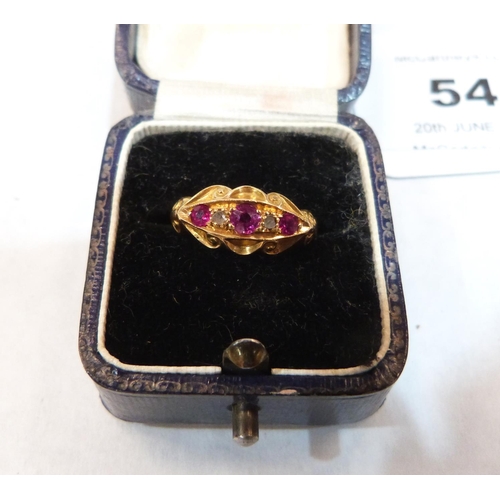 54 - A Victorian five stone ruby and diamond ring. In gold marked 18. Size M. 2.3g gross