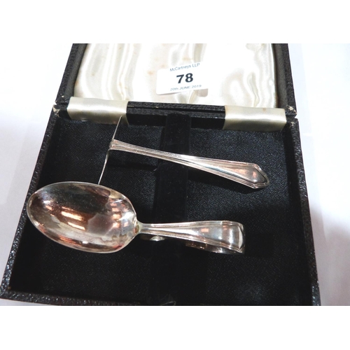 78 - A George V cased silver infant's spoon and pusher. Birmingham 1921