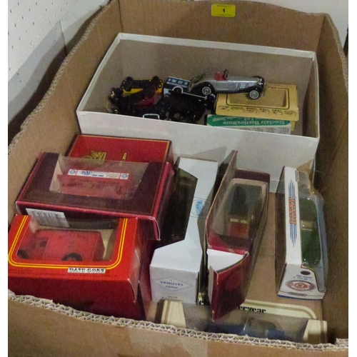 1 - A collection of boxed and unboxed diecast vehicles